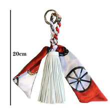 Load image into Gallery viewer, Hand-woven Silk Scarf Car Keychain Accessories Luxury Design PU Tassel Handbag Pendant Fashion Brand Tassels Key Chain for Women
