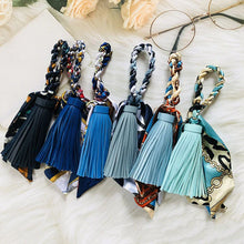 Load image into Gallery viewer, Hand-woven Silk Scarf Car Keychain Accessories Luxury Design PU Tassel Handbag Pendant Fashion Brand Tassels Key Chain for Women
