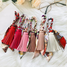 Load image into Gallery viewer, Hand-woven Silk Scarf Car Keychain Accessories Luxury Design PU Tassel Handbag Pendant Fashion Brand Tassels Key Chain for Women
