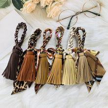 Load image into Gallery viewer, Hand-woven Silk Scarf Car Keychain Accessories Luxury Design PU Tassel Handbag Pendant Fashion Brand Tassels Key Chain for Women
